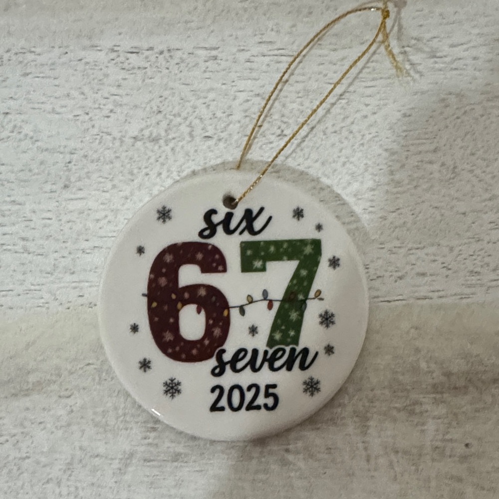 Festive 6 7 Holiday Ceramic Ornament with Red and Green Design with 2025 date.